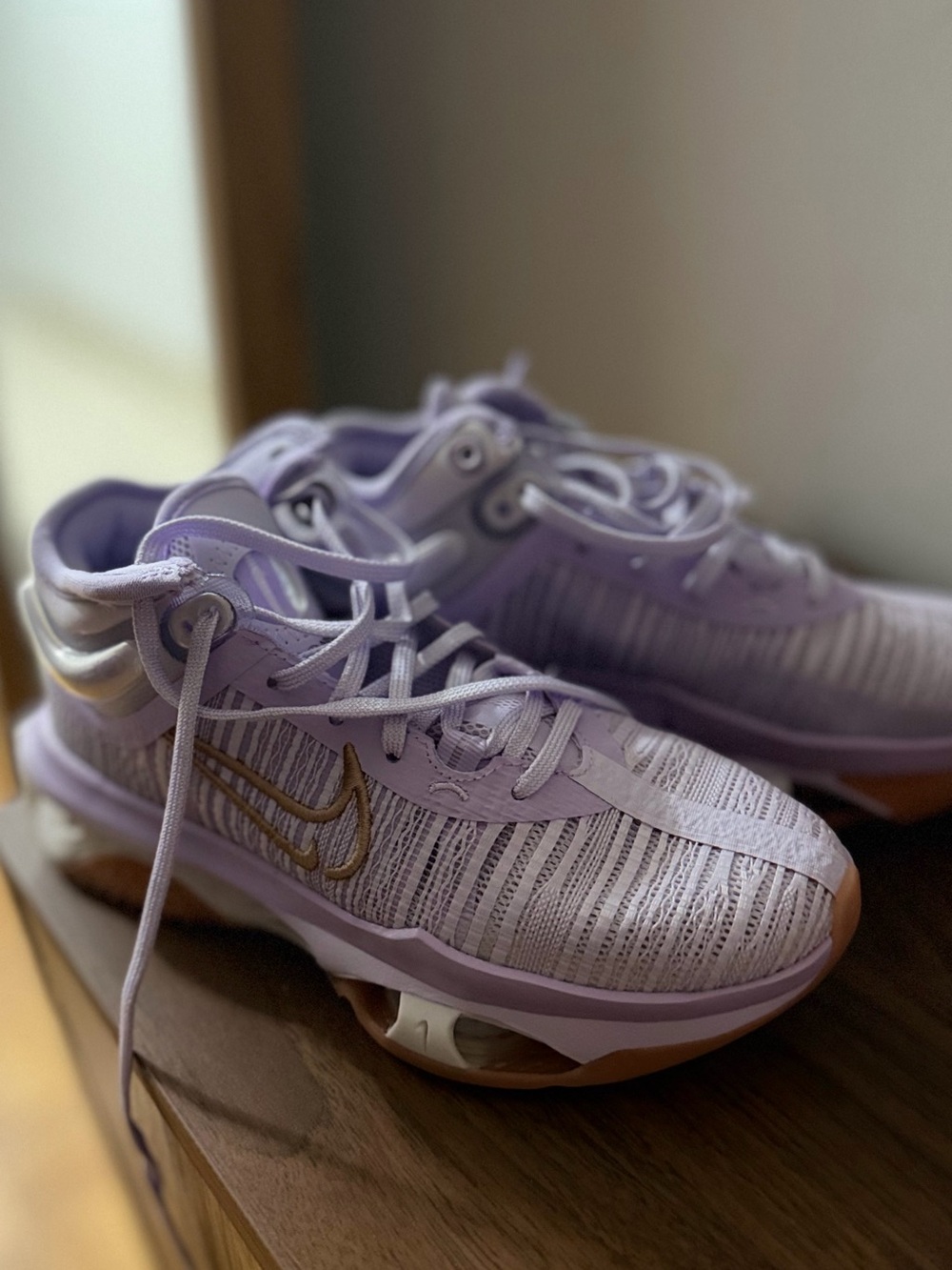 Nike Women's Lavender Athletic Sneakers with Gold Swoosh Accent